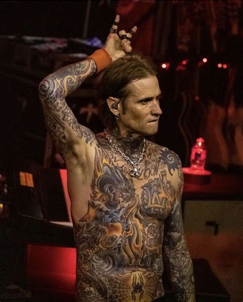 Unlocking the Meaning Behind Josh Todd's Intricate Tattoo Collection